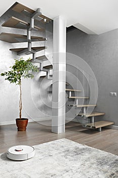 Staircase and column in the interior of the apartment
