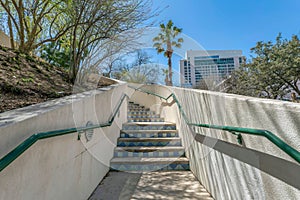 Staircase with concrete half wall and tile risers at San Antonio, Texas