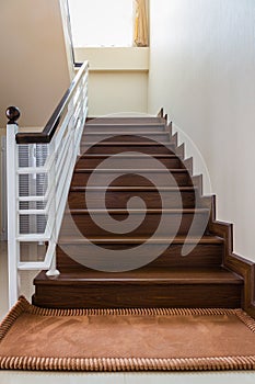 Staircase custom built home interior with wood staircase