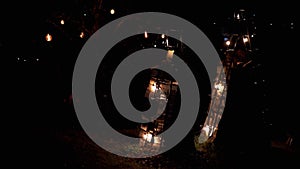 Staircase of Decorative Street Lamps Illuminates the Hotel Courtyard at Night