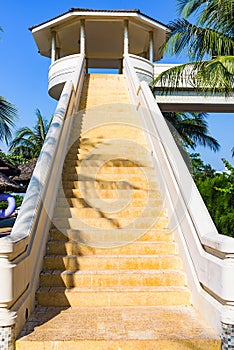 Staircase with a hotel veranda up