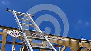 Staircase leading to the roof, wooden roof construction, symbolic photo for home, house building