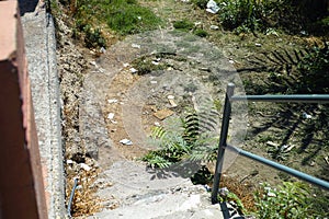 staircase and littered ground