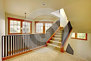 Staircase with metal railing. New luxury home interior. photo