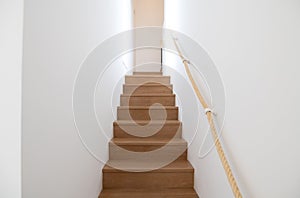 Staircase with rope handrail