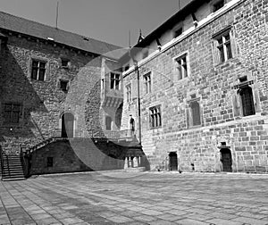 Staircase to the door on the brick wall