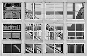 Staircase viewed through open windows