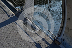 staircase and wide pedestrian bridge with perforated