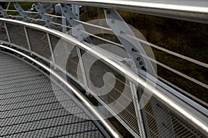 staircase and wide pedestrian bridge with perforated metal floor. galvanized