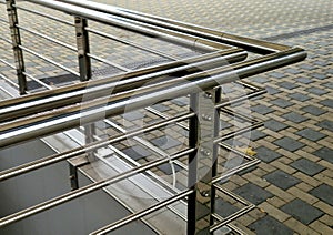 staircase and wide pedestrian bridge with perforated metal floor. galvanized