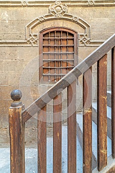 Staircase with wooden balustrade leading to Zeinab Khatoun historic house, Old Cairo, Egypt photo