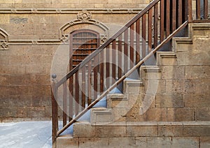 Staircase with wooden balustrade leading to Zeinab Khatoun historic house, Old Cairo, Egypt photo