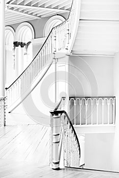 Staircase with wooden handrail. interior design, classic architecture