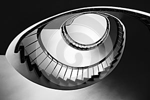 Staircases with grey metal handrails with beautiful pattern