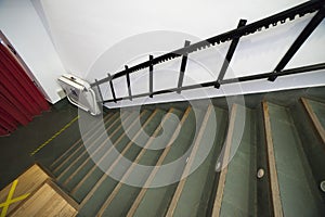 Stairlift for disabled and elderly people to climb stairs at auditorium