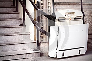 Stairlift on staircase for elderly people and disabled persons