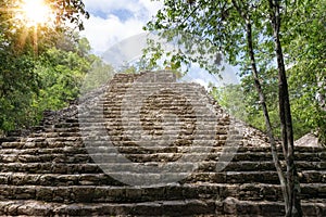 Stairs of an ancient stone pyramid in the Mayan ruins of Coba