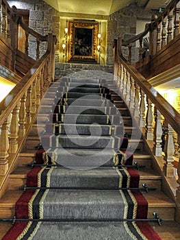 Stairs of a castles or palaces with carpets in stairs