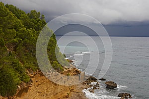 Stairs in the cliff to access to the beach