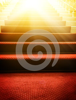 Stairs covered with red carpet