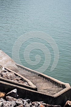 The stairs on the dam to the river.