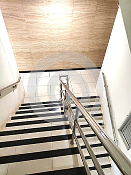 Stairs either go up or down to replace the function of the elevator in certain conditions. photo