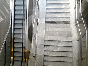 Stairs and escalator view from above in a modern urban building