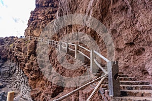 Stairs on the footpath to Nogales beach in the east of La Palma Island, Canary Islands, Spain