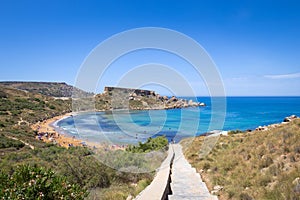 Stairs of Ghajn Tuffieha bay, Malta photo