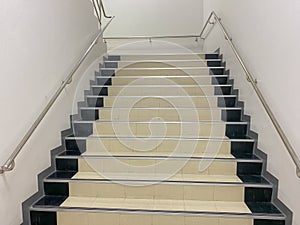 Stairs with hand railing with white background