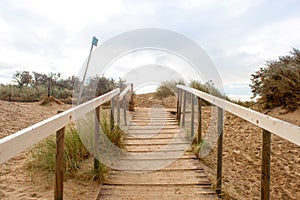 Stairs lead to the top of the dunes.