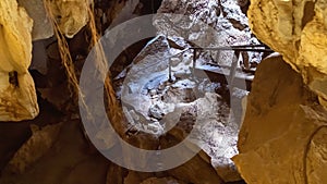 Stairs Leading Across Underground Cave Formations