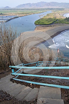 Stairs leading to the top of Teluk Cinta in Jember, Indonesia.