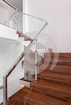 Stairs with metal hand rail