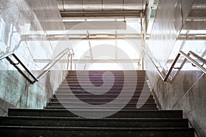 Stairs in metro, way up, urban concrete interior