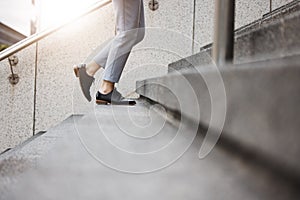 Stairs, morning person and legs walk, travel or on urban journey, outdoor commute or trip to work, destination or job