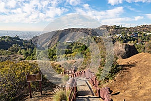 Stairs on observation deck on Hollywood Hills. Warm sunny day. Beautiful clouds in blue sky