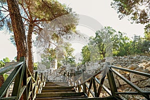 stairs in the park. beautiful view of the ruins of the old town of Phaselis. sunny tourist day