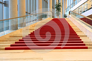 Stairs with red carpet photo