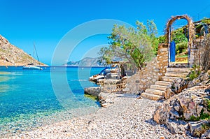 Stairs from sandy beach on Greece island Kalymnos