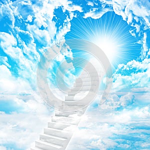 Stairs in sky with clouds and sun