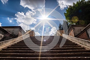 Stairs in sunlight leading up to the church. Way to God. Religious background. Light from sky