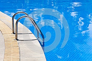 Stairs of a swimming pool photo