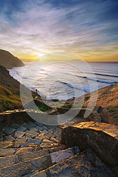 Stairs to the Barrika beach at sunset