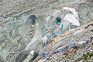 Stairs to the entrance of the ice cave in the glacier Mer de Glace, in Chamonix Mont Blanc Massif, The Alps France