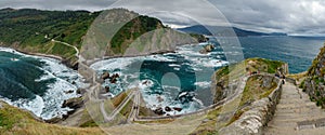 Stairs to San juan de Gaztelugatxe. Huge wide panorama