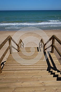 Stairs to the sea of the Alfonso XIII park in Guardamar del Segura, Alicante, Spain photo