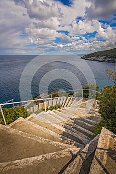 Stairs to the sea in Skinari Cape