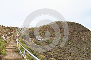 Stairs to top of Kelimutu mountain photo