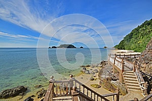 Stairs towards Pasir Panjang at Pulau Kapas Island, Marang, Terengganu, Malaysia with a view of smaller Pulau Gemia photo